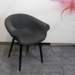 Chair upholstered in black fabric