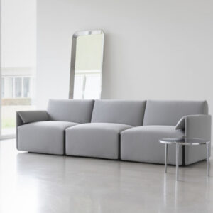 "Modular sofa with detachable white and red covers, rectangular, for interior use
